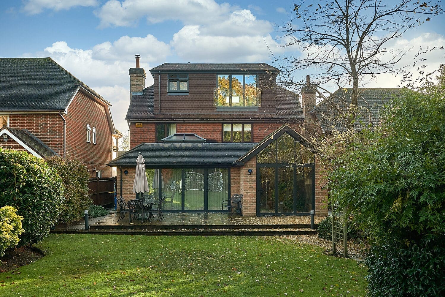 crown roof dormer loft conversion exterior with juliet balcony 