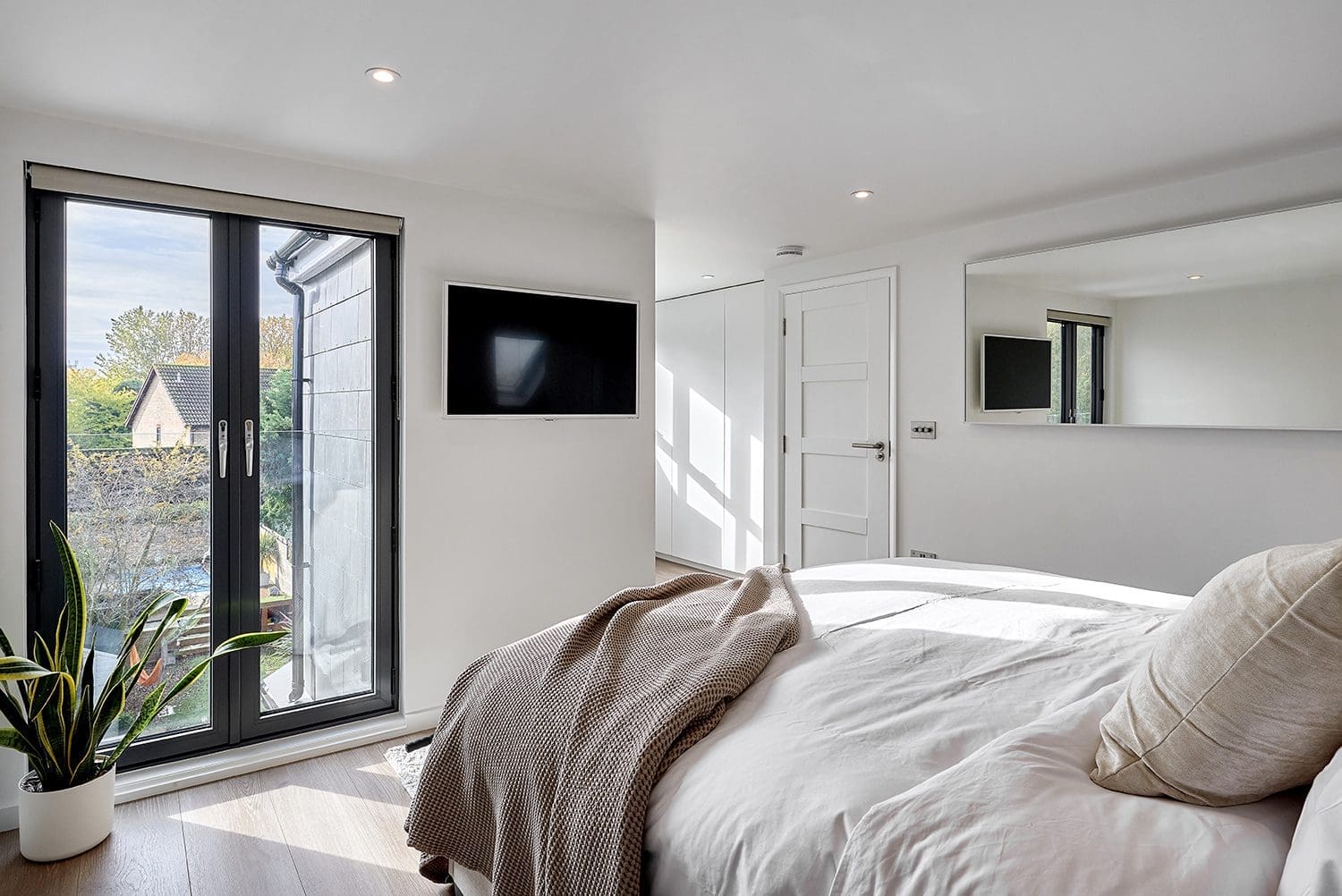 Bedroom Loft Conversion with Balcony move vs loft conversion - minimalist loft conversion master bedroom with glass doors