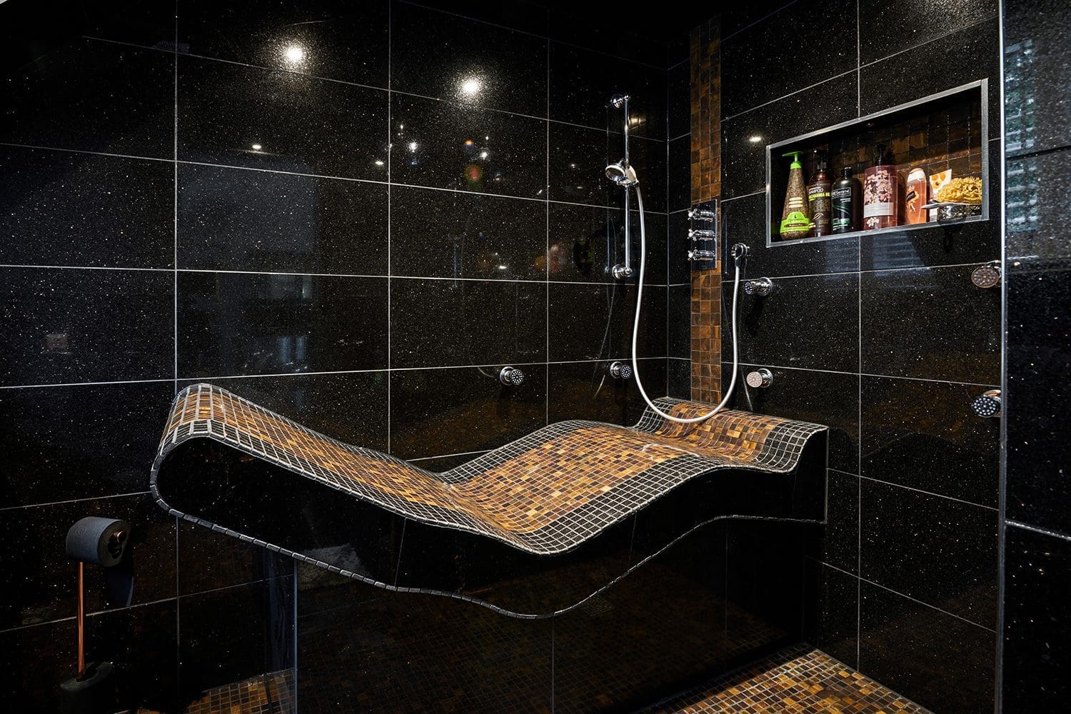 loft conversion bathroom with pendant hanging from under the eaves