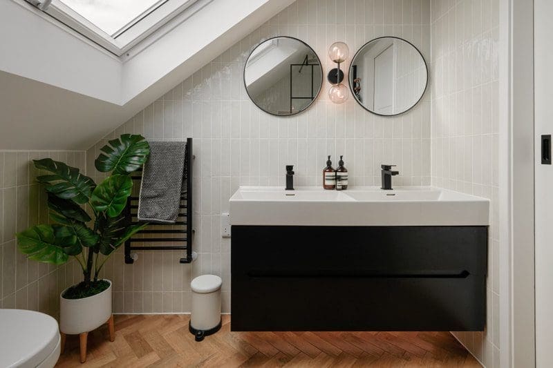 loft conversion bathroom with sustainable design and energy-efficient lighting