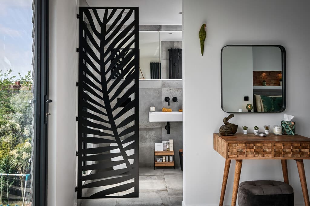 open plan loft conversion with divide into bathroom